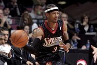 EAST RUTHERFORD, NJ - DECEMBER 10: Allen Iverson #3 of the Philadelphia 76ers looks to make a pass against the New Jersey Nets during their game at Continental Airlines Arena on December 10, 2005 in East Rutherford, New Jersey.The Sixers defeated the Nets 107-95. NOTE TO USER: User expressly acknowledges and agrees that, by downloading and or using this photograph, User is consenting to the terms and conditions of the Getty Images License Agreement. (Photo by Jim McIsaac/Getty Images)             