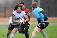 LONDON, ENGLAND - DECEMBER 03:  Malili Muliaina (L) of New Zealand takes on Adam Thompson during an All Blacks training session at Harrow School on December 3, 2009 in London, England.  (Photo by Christopher Lee/Getty Images)