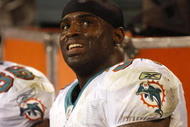 CHARLOTTE - NOVEMBER 19: Ricky Williams #34 of the Miami Dolphins smiles on the bench after he scored his second TD of the game in the second quarter against the Carolina Panthers at Bank of America Stadium on November 19, 2009 in Charlotte, North Carolina. (Photo by Streeter Lecka/Getty Images)
