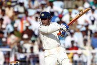 CHENNAI, INDIA - DECEMBER 14: Virender Sehwag of India hits out at James Andersons bowling during day 4 of the First Test Match between India and England at the MA Chidambaram Stadium on December 14, 2008 in Chennai, India.  (Photo by Julian Herbert/Getty Images)
