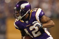 MINNEAPOLIS - NOVEMBER 22:  Percy Harvin #12 of the Minnesota Vikings runs the ball against the Seattle Seahawks at Hubert H. Humphrey Metrodome on November 22, 2009 in Minneapolis, Minnesota.  (Photo by Nick Laham/Getty Images)