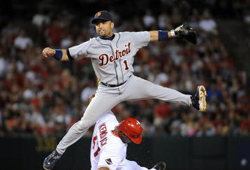 ANAHEIM, CA - AUGUST 25:  Placido Polanco #14 of the Detroit Tigers turns a double play on Howie Kendrick #47 of the Los Angeles Angels of Anaheim during the sixth inning at Angel Stadium of Anaheim on August 25, 2009 in Anaheim, California.  (Photo by Harry How/Getty Images)