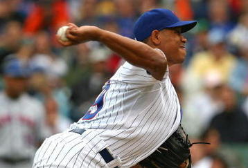 CHICAGO - AUGUST 28: Carlos Marmol #49 of the Chicago Cubs pitches in the 9th inning against the New York Mets on August 28, 2009 at Wrigley Field in Chicago, Illinois. The Cubs defeated the Mets 5-2.  (Photo by Jonathan Daniel/Getty Images)