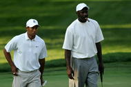CHARLOTTE, NC - MAY 02:  Tiger Woods watches on with basketball star Michael Jordan on the 5th green during the Pro-am at the Wachovia Championship at Quail Hollow Country Club on May 2, 2007 in Charlotte, North Carolina.  (Photo by Streeter Lecka/Getty Images)