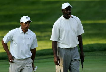 CHARLOTTE, NC - MAY 02:  Tiger Woods watches on with basketball star Michael Jordan on the 5th green during the Pro-am at the Wachovia Championship at Quail Hollow Country Club on May 2, 2007 in Charlotte, North Carolina.  (Photo by Streeter Lecka/Getty Images)