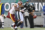 PHILADELPHIA - NOVEMBER 29:  Jeremy Maclin #18 of the Philadelphia Eagles makes a catch and is pushed out of bounds by London Fletcher #59  of the Washington Redskins during their game at Lincoln Financial Field on November 29, 2009 in Philadelphia, Pennsylvania.  (Photo by Al Bello/Getty Images)