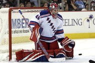 PITTSBURGH, PA - NOVEMBER 28:  Steve Valiquette #40 of the New York Rangers makes a save on the Pittsburgh Penguins in the third period at Mellon Arena on November 28, 2009 in Pittsburgh, Pennsylvania.  Penguins won 8-3.  (Photo by Justin K. Aller/Getty Images)