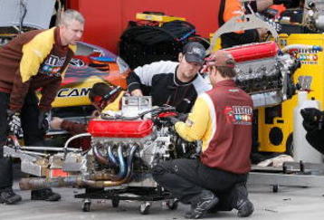 LAS VEGAS - FEBRUARY 27: Crew members for the #18 M&M's Toyota driven by Kyle Busch change engines during practice for the NASCAR Sprint Cup Series Shelby 427 at the Las Vegas Motor Speedway on February 27, 2009 in Las Vegas, Nevada.  (Photo by John Harrelson/Getty Images for Nascar)