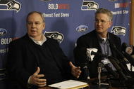 KIRKLAND, WA - FEBRUARY 06: Team president Tim Ruskell (L) and CEO Tod Leiweke of the Seattle Seahawks address the media during a press conference announcing that Seahawks' assistant coach Jim Mora will take over as head coach in the 2009 season, on February 6, 2008 at Seahawks Headquarters in Kirkland, Washington. Holmgren will coach the team in 2008. (Photo by Otto Greule Jr/Getty Images)