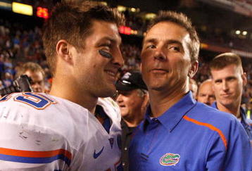 COLUMBIA, SC - NOVEMBER 14:  Head coach Urban Meyer and quarterback Tim Tebow #15 of the Florida Gators celebrate after a 24-14 victory over the South Carolina Gamecocks during their game at Williams-Brice Stadium on November 14, 2009 in Columbia, South Carolina.  (Photo by Streeter Lecka/Getty Images)