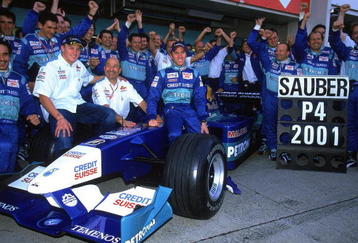 14 Oct 2001:  Sauber drivers Nick Heidfeld (front left) and Kimi Raikkonen (front right) celebrate 4th place in the Constructors Championship with Boss Peter Sauber (front centre) after the Formula One Japanese Grand Prix held at Suzuka in Suzuka, Japan.\ Mandatory Credit: Mark Thompson /Allsport