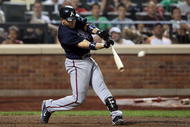 NEW YORK - AUGUST 20:  Omar Infante #4 of the Atlanta Braves bats against the New York Mets on August 20, 2009 at Citi Field in the Flushing neighborhood of the Queens borough of New York City.  (Photo by Jim McIsaac/Getty Images)