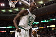 BOSTON - FEBRUARY 08:  Kevin Garnett #5 of the Boston Celtics celebrates a shot against the San Antonio Spurs on February 8, 2009 at TD Banknorth Garden in Boston, Massachusetts. The Spurs defeated the Celtics 105-99. NOTE TO USER: User expressly acknowledges and agrees that, by downloading and or using this Photograph, user is consenting to the terms and conditions of the Getty Images License Agreement.  (Photo by Elsa/Getty Images)