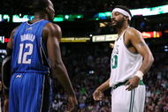 BOSTON - NOVEMBER 20: Rasheed Wallace #30 of the Boston Celtics has a few words with Dwight Howard #12 of the Orlando Magic during the game on November 20, 2009 at the TD Garden in Boston, Massachusetts. NOTE TO USER: User expressly acknowledges and agrees that, by downloading and or using this photograph, User is consenting to the terms and conditions of the Getty Images License Agreement.  (Photo by Elsa/Getty Images)