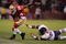 SAN FRANCISCO - NOVEMBER 12: Michael Robinson #24 of the San Francisco 49ers tries to stay in bounds as Lance Briggs #55 of the Chicago Bears dives after him at Candlestick Park on November 12, 2009 in San Francisco, California.  (Photo by Ezra Shaw/Getty Images)