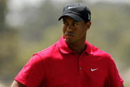 MELBOURNE, AUSTRALIA - NOVEMBER 15:  Tiger Woods of the USA prepares to play an approach shot on the 1st hole during the final round of the 2009 Australian Masters at Kingston Heath Golf Club on November 15, 2009 in Melbourne, Australia.  (Photo by Mark Dadswell/Getty Images)