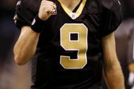 NEW ORLEANS - NOVEMBER 30: Quarterback Drew Brees #9 of the New Orleans Saints celebrates after a touchdown against the New England Patriots at Louisana Superdome on November 30, 2009 in New Orleans, Louisiana. (Photo by Chris Graythen/Getty Images)