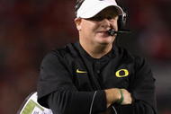 TUCSON, AZ - NOVEMBER 21:  Head coach Chip Kelly of the Oregon Ducks walks the sidelines during the college football game against the Arizona Wildcats at Arizona Stadium on November 21, 2009 in Tucson, Arizona. The Ducks defeated the Wildcats 44-41 in second overtime.  (Photo by Christian Petersen/Getty Images)
