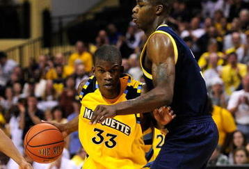 ORLANDO, FL - NOVEMBER 27:  Jimmy Butler #33 of the Marquette Golden Eagles drives against the Michigan Wolverines during the Old Spice Classic at Disney's Milk House on November 27, 2009 in Orlando, Florida. Marquette defeated Michigan 79-65.  (Photo by Sam Greenwood/Getty Images)