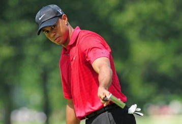 AKRON, OH - AUGUST 09:  Tiger Woods of USA celebrates his eagle putt on the second hole during the final round of the World Golf Championship Bridgestone Invitational on August 9, 2009 at Firestone Country Club in Akron, Ohio.  (Photo by Stuart Franklin/Getty Images)