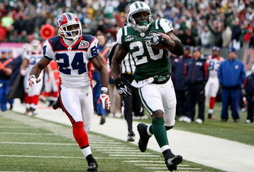 EAST RUtheRFORD, NJ - OCTOBER 18:  Thomas Jones #20 of the New York Jets scores a touchdown as Terrence McGee #24 of the Buffalo Bills defends during their game on October 18, 2009 at Giants Stadium in East Rutherford, New Jersey.  (Photo by Al Bello/Getty Images)