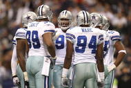 IRVING, TX - DECEMBER 20: DeMarcus Ware #94 of the Dallas Cowboys huddles together with his defensive line during their NFL game against the Baltimore Ravens at Texas Stadium on December 20, 2008 in Irving, Texas. The Ravens defeated the Cowboys 33-24. (Photo by Ronald Martinez/Getty Images)