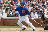 CHICAGO - JULY 03:  Jake Fox #5 of the Chicago Cubs at bat against the Milwaukee Brewers during their MLB game on July 3, 2009 at Wrigley Field in Chicago, Illinois. (Photo by Jonathan Daniel/Getty Images) 