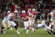 PALO ALTO, CA - NOVEMBER 28:  Toby Gerhart #7 of the Stanford Cardinal runs with the ball during their game against the Notre Dame Fighting Irish at Stanford Stadium on November 28, 2009 in Palo Alto, California.  (Photo by Ezra Shaw/Getty Images)