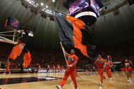 CHAMPAIGN, IL - JANUARY 28:  The cheer squad of the Illinois Fighting Illini come onto the court during a break in game action against the Purdue Boilermakers on January 28, 2006 at the Assembly Hall at the University of Illinois in Champaign, Illinois. (Photo by Jonathan Daniel/Getty Images)