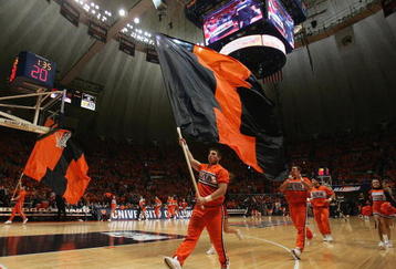 CHAMPAIGN, IL - JANUARY 28:  The cheer squad of the Illinois Fighting Illini come onto the court during a break in game action against the Purdue Boilermakers on January 28, 2006 at the Assembly Hall at the University of Illinois in Champaign, Illinois. (Photo by Jonathan Daniel/Getty Images)