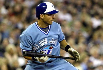 TORONTO - APRIL 4:  Marco Scutaro #19 of the Toronto Blue Jays looks to bunt against the Boston Red Sox at the Blue Jays' home opener at the Rogers Centre April 4, 2008 in Toronto, Ontario, Canada.  (Photo By Dave Sandford/Getty Images)