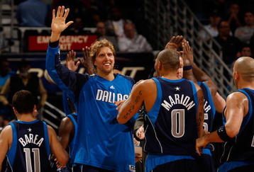 NEW ORLEANS - NOVEMBER 04:  Dirk Nowitzki #41  and Shawn Marion #0 of the Dallas Mavericks celebrates during the game against the New Orleans Hornets at New Orleans Arena on November 4, 2009 in New Orleans, Louisiana.  NOTE TO USER: User expressly acknowledges and agrees that, by downloading and or using this photograph, User is consenting to the terms and conditions of the Getty Images License Agreement.  (Photo by Chris Graythen/Getty Images)