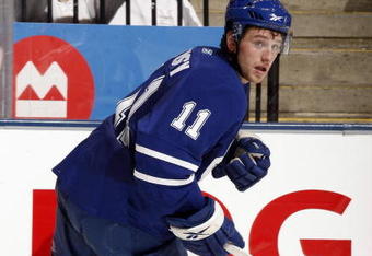 TORONTO - SEPTEMBER 22:  Jiri Tlusty #11 of the Toronto Maple Leafs skates against the Pittsburgh Penguins during a pre-season  NHL game at the Air Canada Centre on September 22, 2009 in Toronto, Ontario, Canada .  (Photo by Abelimages/Getty Images) 