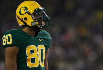 EUGENE,OR - DECEMBER 03:  Lavasier Tuinei #80 of the Oregon Ducks watches the game against the Oregon State Beavers at Autzen Stadium on December 3, 2009 in Eugene, Oregon. (Photo by Tom Hauck/Getty Images)