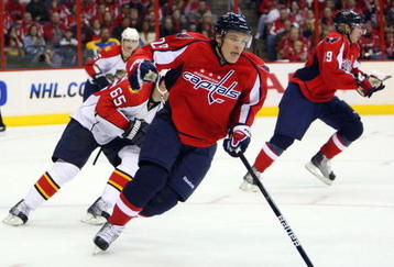 WASHINGTON - NOVEMBER 7: Alexander Semin #28 of the Washington Capitals controls the puck against Victor Oreskovich #65 of the Florida Panthers during an NHL hockey game on November 7, 2009 at the Verizon Center in Washington, DC. (Photo by Ned Dishman/Getty Images)