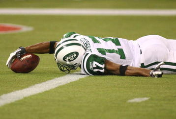 TORONTO - DECEMBER 3: Braylon Edwards #17 of the New York Jets scores a 13-yard touchdown reception in the second quarter against the Buffalo Bills at Rogers Centre on December 3, 2009 in Toronto, Canada.  (Photo by Rick Stewart/Getty Images)