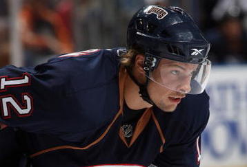 EDMONTON, CANADA - SEPTEMBER 23:  Robert Nilsson #12 of the Edmonton Oilers looks on during the game against the Calgary Flames on September 23, 2009 at Rexall Place in Edmonton, Alberta, Canada. (Photo by Dale MacMillan/Getty Images)