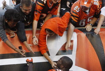 CINCINNATI - NOVEMBER 8: Chad Ochocinco #85 of the Cincinnati Bengals celebrates with his fans after defeating the Baltimore Ravens 17-7 at Paul Brown Stadium on November 8, 2009 in Cincinnati, Ohio.  (Photo by John Sommers II/Getty Images)
