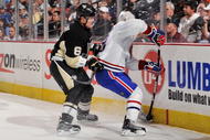 PITTSBURGH - NOVEMBER 25:  Defenseman Ben Lovejoy #6 finishes a check on forward Kyle Chipchura #28 of the Montreal Canadiens on November 25, 2009 at Mellon Arena in Pittsburgh, Pennsylvania.  (Photo by Jamie Sabau/Getty Images)