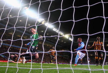 BIRMINGHAM, ENGLAND - MAY 04:  Boaz Myhill of Hull City makes a save at close range from Gabriel Agbonlahor of Aston Villa during the Barclays Premier League match between Aston Villa and Hull City at Villa Park on May 4, 2009 in Birmingham, England. (Photo by Jamie McDonald/Getty Images)