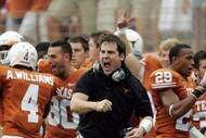 AUSTIN, TX - SEPTEMBER 5:  Defensive coordinator Will Muschamp of the Texas Longhorns gets pumped up after a turnover by the Louisiana Monroe Warhawks in the first quarter on September 5, 2009 at Darrell K Royal-Texas Memorial Stadium in Austin, Texas.  (Photo by Brian Bahr/Getty Images)