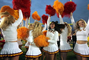 PASADENA, CA - DECEMBER 4:  USC Trojans cheerleaders celebrate the team's 29-24 victory over the UCLA Bruins on December 4, 2004 at the Rose Bowl in Pasadena, California (Photo by Jeff Gross/Getty Images)
