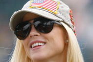 SAN FRANCISCO - OCTOBER 10:  Elin Woods watches the play during the Day Three Morning Foursome Matches of The Presidents Cup at Harding Park Golf Course on October 10, 2009 in San Francisco, California.  (Photo by Scott Halleran/Getty Images)