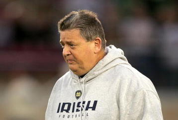 PALO ALTO, CA - NOVEMBER 28:  Notre Dame head coach Charlie Weis walks off the field after warmups for their game against the Stanford Cardinal at Stanford Stadium on November 28, 2009 in Palo Alto, California.  (Photo by Ezra Shaw/Getty Images)