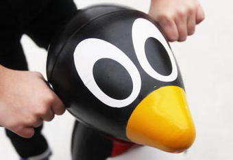 LAMBERHURST, ENGLAND - NOVEMBER 20:  Children ice skate with toy penguins at Lapland UK on November 20, 2009 in Lamberhurst, England. Lapland UK looks to offer a Christmas experience set in a snow covered forest with real Huskies, Reindeer and Father Christmas himself and is one of the United Kingdom's many festive experiences on offer in the weeks before Christmas.  (Photo by Dan Kitwood/Getty Images)