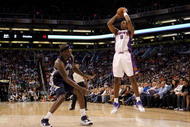 PHOENIX - NOVEMBER 25:  Channing Frye #8 of the Phoenix Suns puts up a shot against the Memphis Grizzlies during the NBA game at US Airways Center on November 25, 2009 in Phoenix, Arizona. NOTE TO USER: User expressly acknowledges and agrees that, by downloading and or using this photograph, User is consenting to the terms and conditions of the Getty Images License Agreement.  (Photo by Christian Petersen/Getty Images)