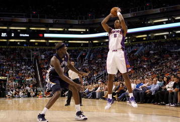 PHOENIX - NOVEMBER 25:  Channing Frye #8 of the Phoenix Suns puts up a shot against the Memphis Grizzlies during the NBA game at US Airways Center on November 25, 2009 in Phoenix, Arizona. NOTE TO USER: User expressly acknowledges and agrees that, by downloading and or using this photograph, User is consenting to the terms and conditions of the Getty Images License Agreement.  (Photo by Christian Petersen/Getty Images)