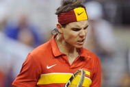 BARCELONA, SPAIN - DECEMBER 04: Rafael Nadal of Spain celebrates after winning a point against Tomas Berdych of Czech Republic during the first match of the Davis Cup final at the Palau Sant Jordi stadium on December 4, 2009 in Barcelona, Spain.  (Photo by Denis Doyle/Getty Images)