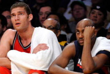 LOS ANGELES, CA - NOVEMBER 29:  Devin Harris (L) Brook Lopez (C) and Trenton Hassell of the New Jersey Nets reacts after a missed shot by a teammate in the closing minutes of the basketball game against the Los Angeles Lakers at Staples Center on November 29, 2009 in Los Angeles, California. The Nets tied for the worst start to an NBA season with their 17th straight loss. NOTE TO USER: User expressly acknowledges and agrees that, by downloading and/or using this Photograph, user is consenting to the terms and conditions of the Getty Images License Agreement.  (Photo by Kevork Djansezian/Getty Images)