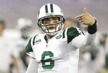 TORONTO - DECEMBER 3: Quarterback Mark Sanchez #6 of the New York Jets gestures on the field against the Buffalo Bills at Rogers Centre on December 3, 2009 in Toronto, Canada.  (Photo by Rick Stewart/Getty Images)